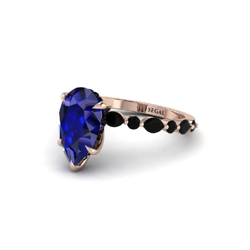 Trendy Statement Rings For Fashion Lovers-Pear-Cut Sapphire Halo Engagement Ring - Nylah No. 44