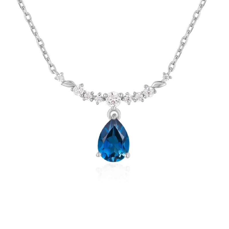 Elegant Gold Pendant Necklaces For Special Occasions-Breezy Whisper London Blue Topaz Necklace