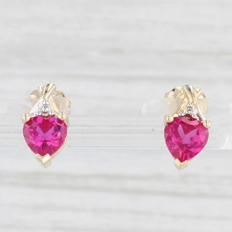 Luxury Diamond Earrings For Elegant Nights-1.20ctw Lab Created Ruby Heart Stud Earrings 10k Yellow Gold