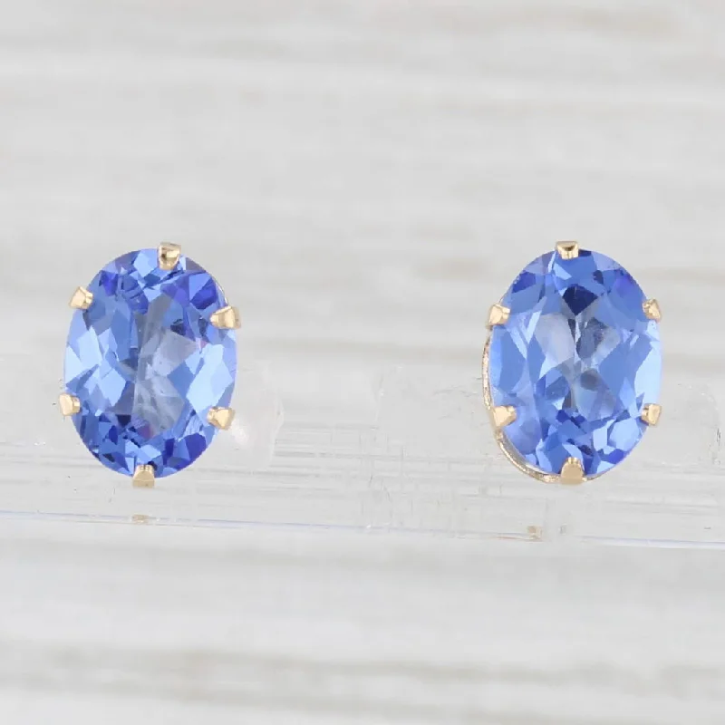 Bold Earrings For Fashionistas-Blue Glass Solitaire Stud Earrings 14k Yellow Gold Oval Solitaire Studs