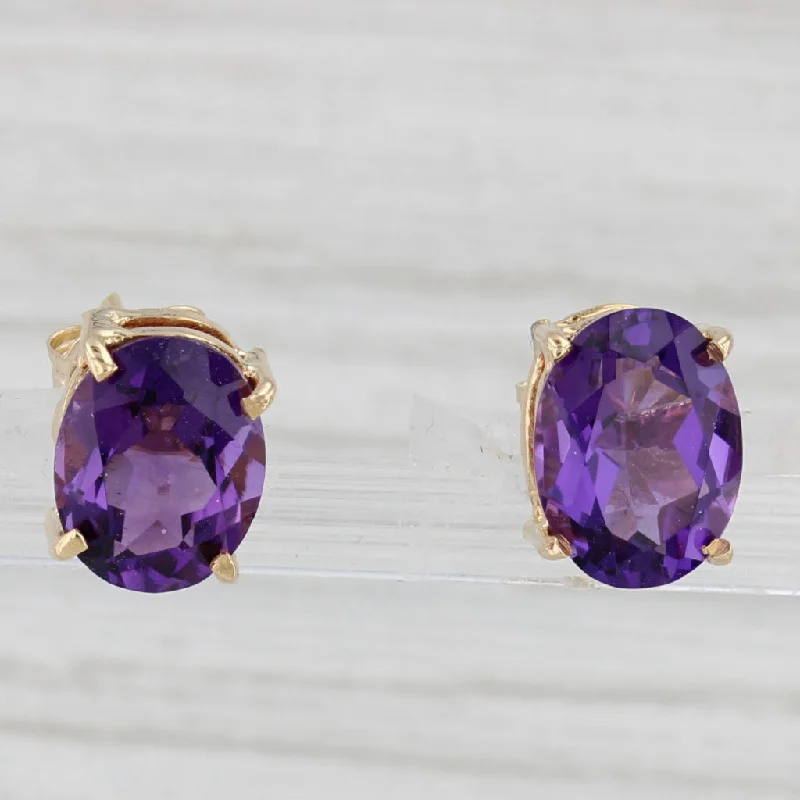 Sparkling Stud Earrings For Formal Events-3ctw Oval Amethyst Stud Earrings 14k Yellow Gold